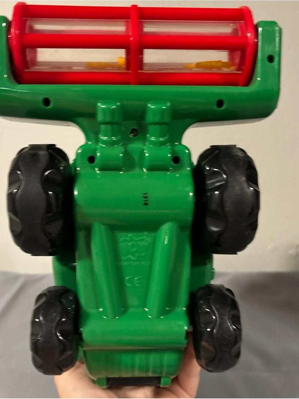 Green Farm Combine Toy with Red Accents